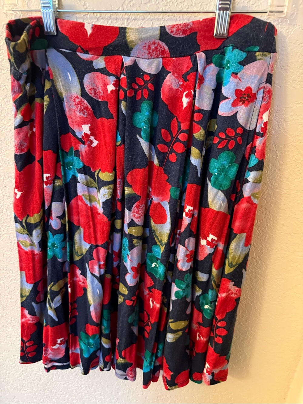 Size Small LuLaRoe Madison skirt, navy blue w/red, teal and purple floral print